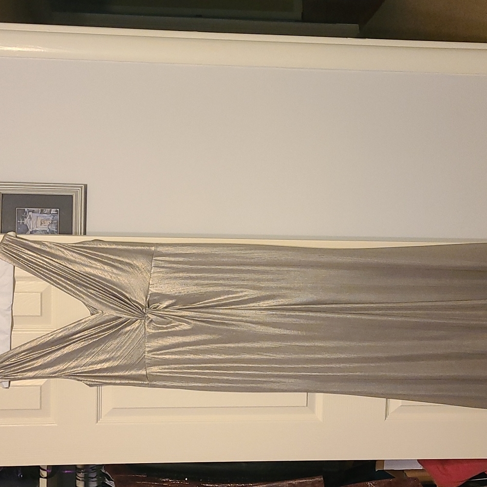 Calvin Klein Metallic Silver Gown. Beautiful fluid stretch. Figure flattering!